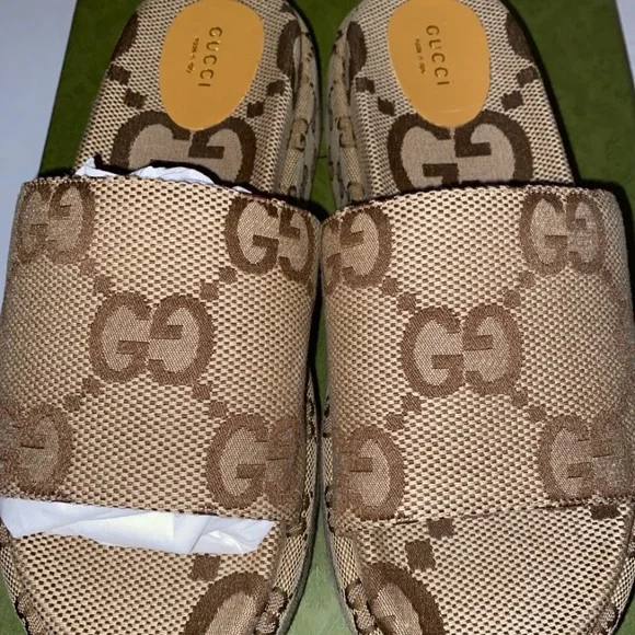 Gucci | Shoes | Gucci Tan And Brown Gg Logo Slides | Poshmark display picture 1